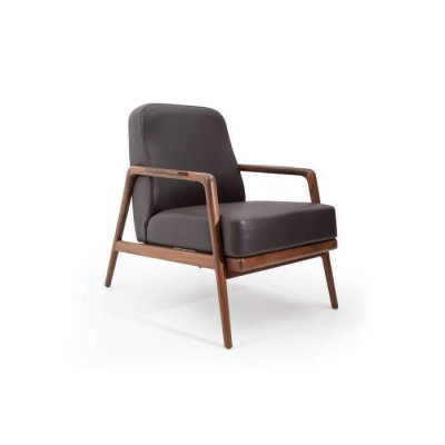  Design-Akkzent: Sessel in Trendfarbe mit schlichtem Holzrahmen neu